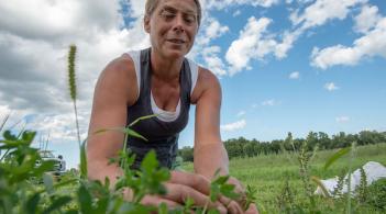Heather Darby working in a field