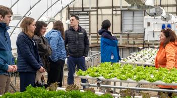 MAcc Students in Green House