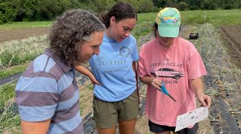Vic Izzo and AX fellows looking at research in the field