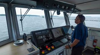 Taylor Resnick captaining the R/V MM.