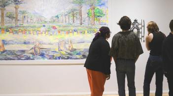 Students in the gallery viewing art