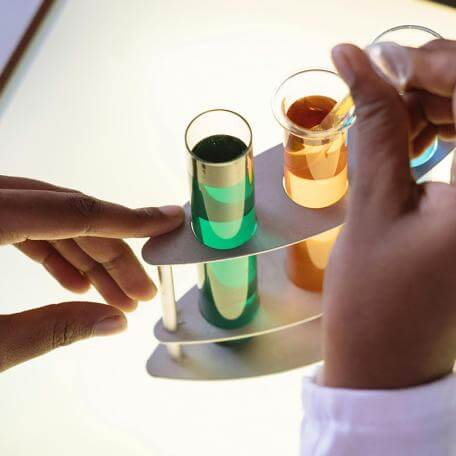 closeup of someone handling a test tube