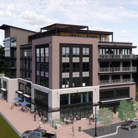 A rendering of a modern 5-story apartment building. 