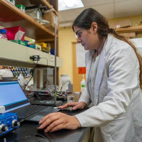 CEE Post-Doctoral student at work in Environmental lab