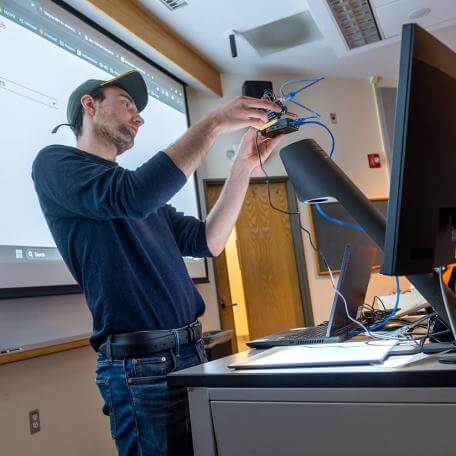 CS student presents his project to the class