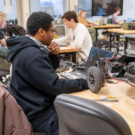 EE student at work on a senior capstone project