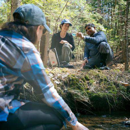 Environmental Engineering students at work with faculty in the field