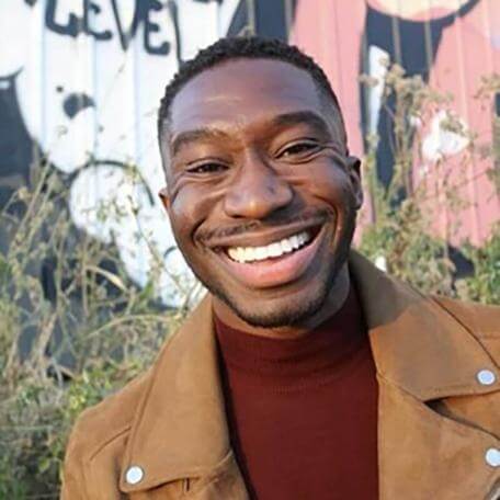 person smiling while posing for a photo