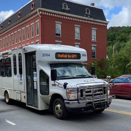 Small bus traveling in Montpelier