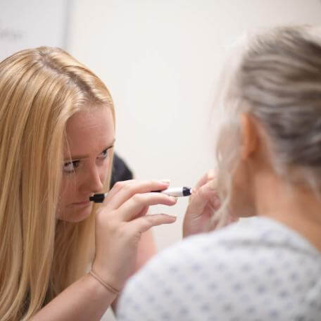 Clinician in emergency room with patient