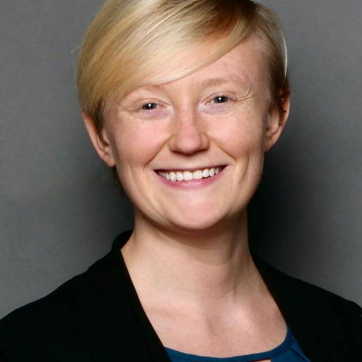 Lakelyn in a blue blouse and black blazer.