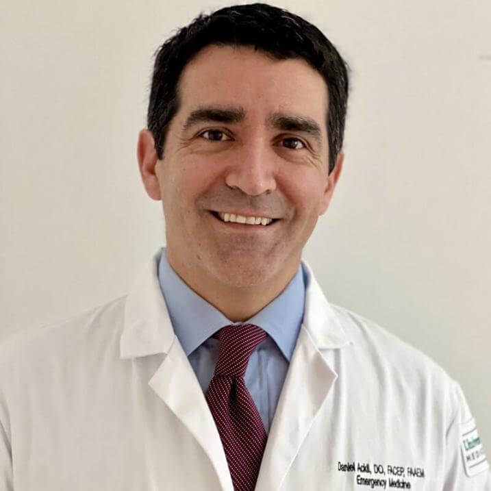 headshot of smiling doctor