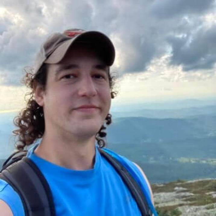 Ben on a mountain summit