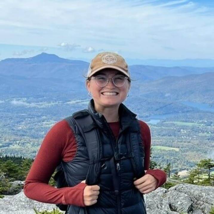 Emily on a mountain summit