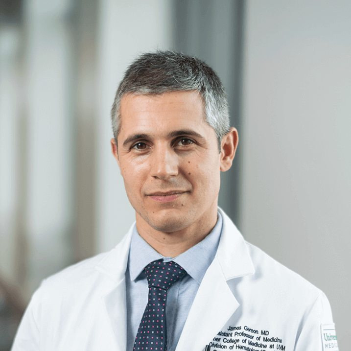 headshot of smiling doctor