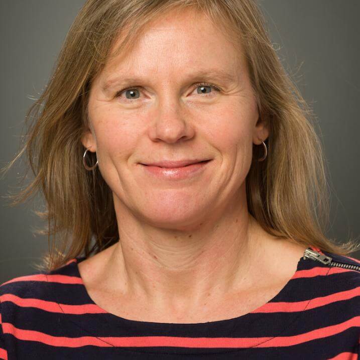 A person wearing a striped shirt