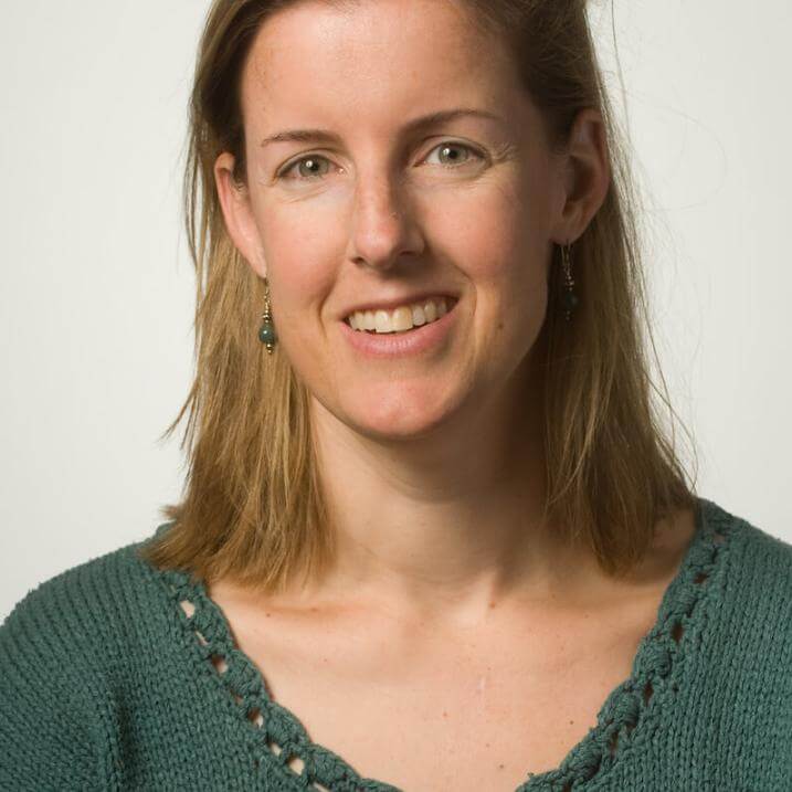 A person wearing a green shirt 