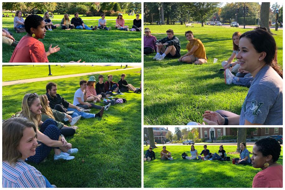 Students engaged in a group discussion on the UVM Green
