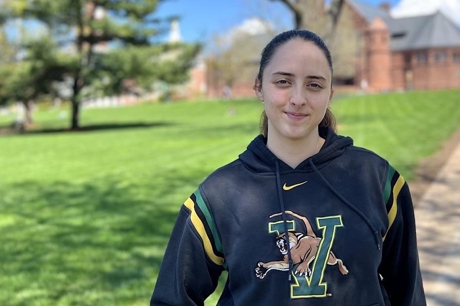 Kendra Keelty smiling on the University Green.