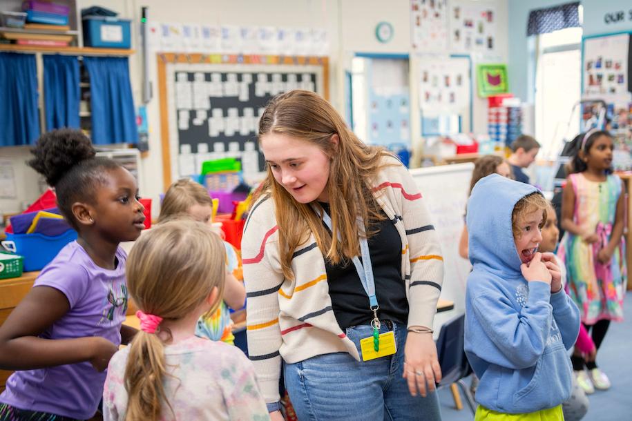 Sarah Bassett with students at Orchard Elementary School
