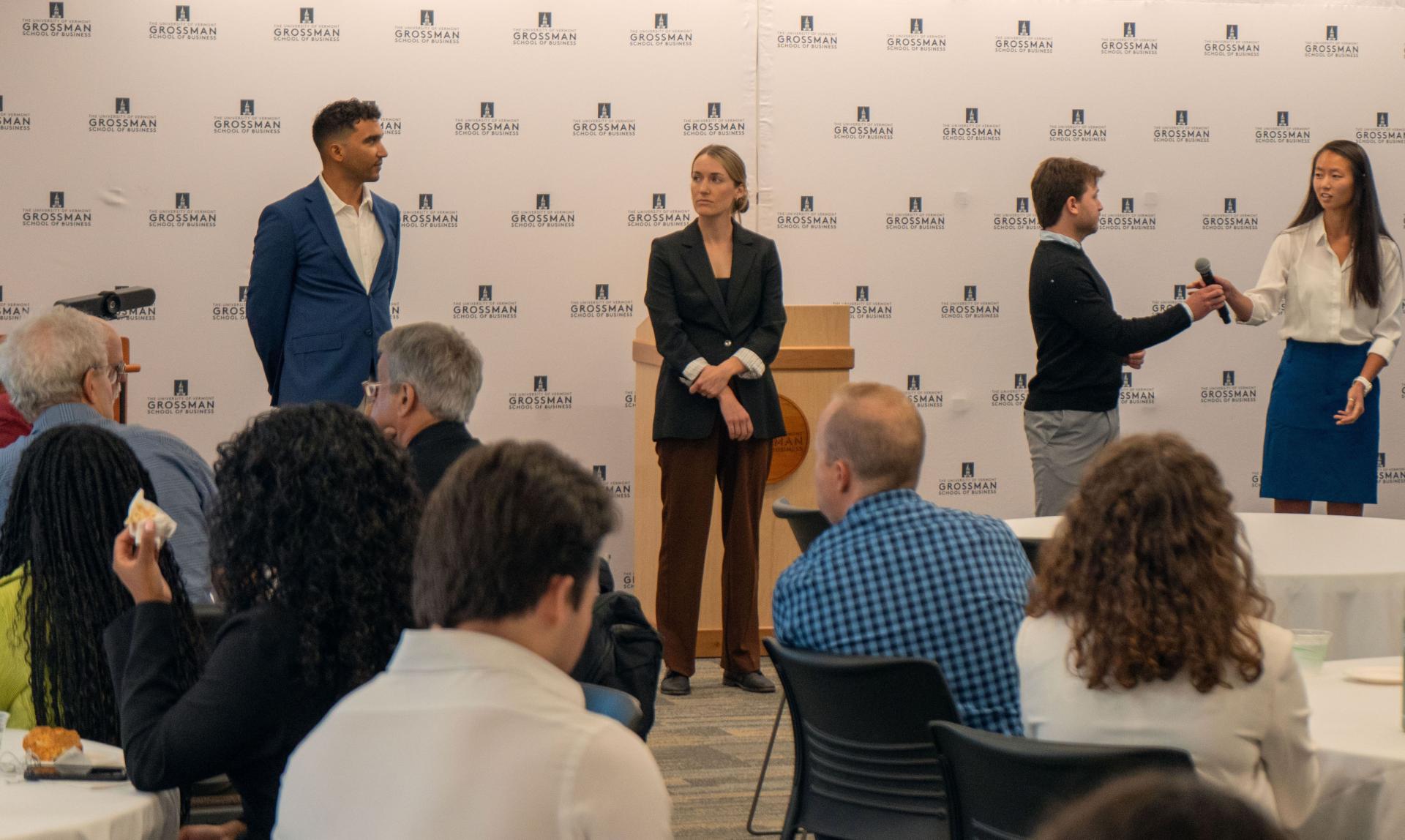 SI-MBA students presenting their Practicum pitches.