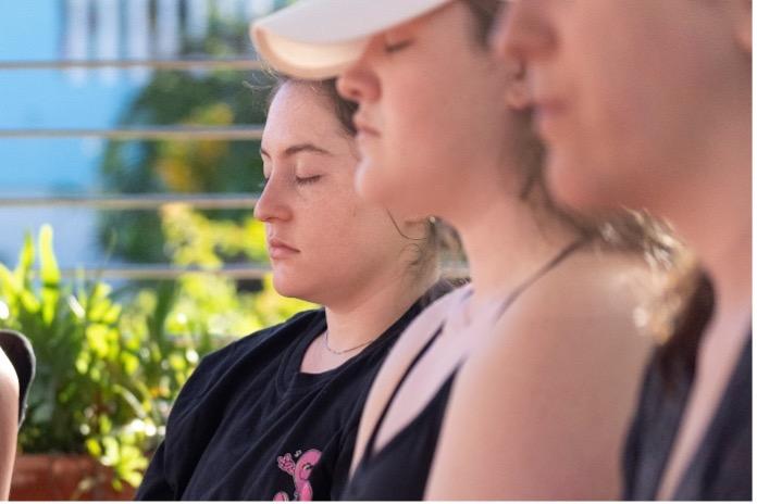 students meditating