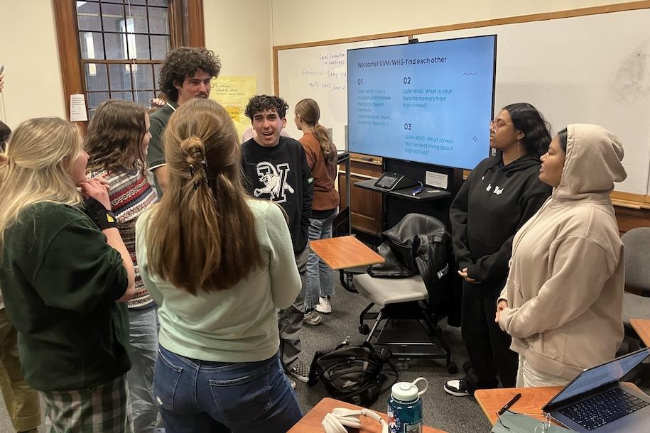 students talking in a classroom