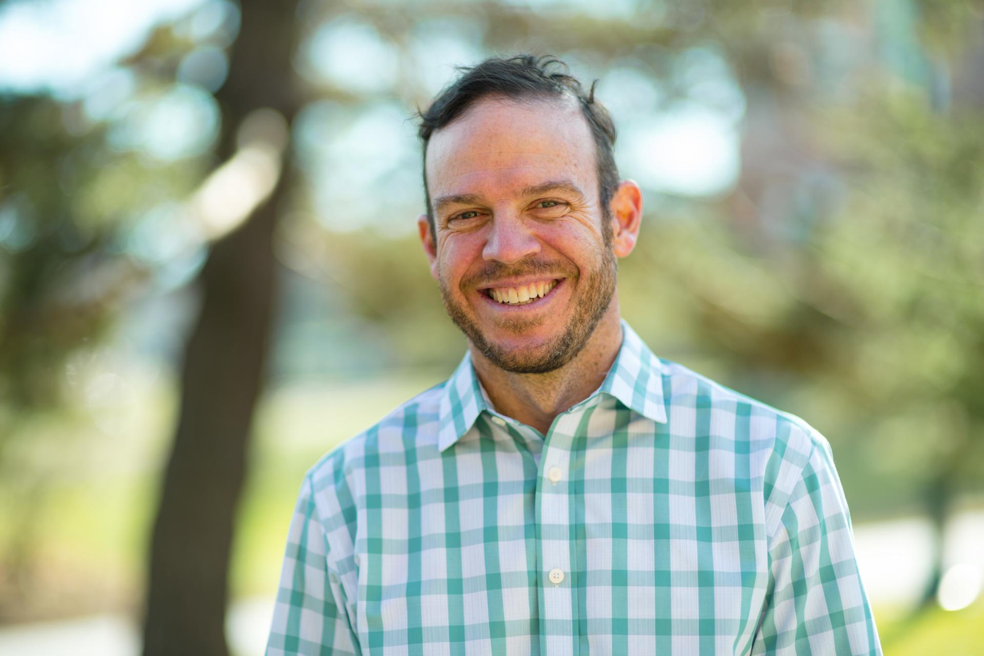Brendan Fisher smiles
