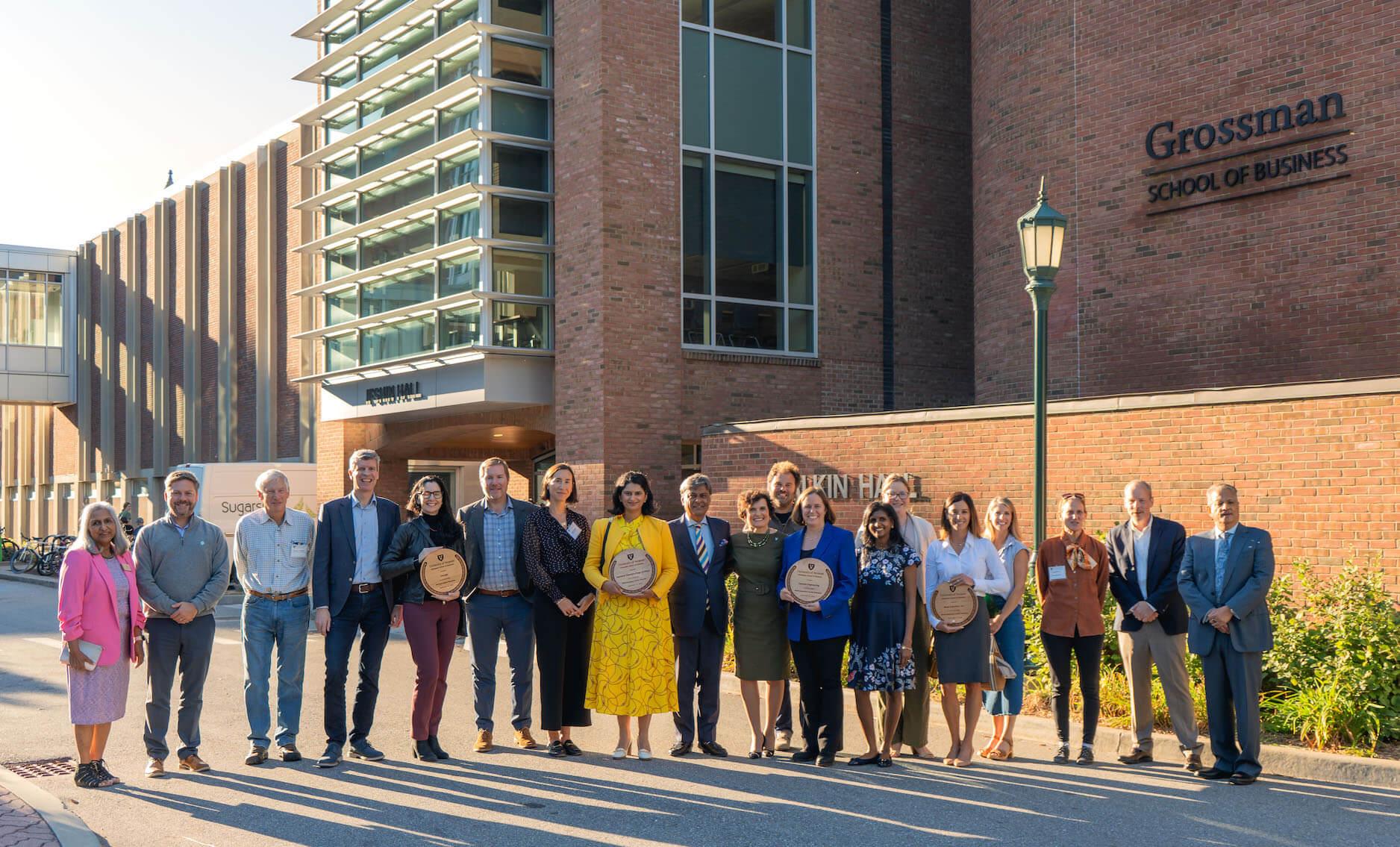 Winners of the 2024 VLFEA stand in front of the UVM Grossman School of Business