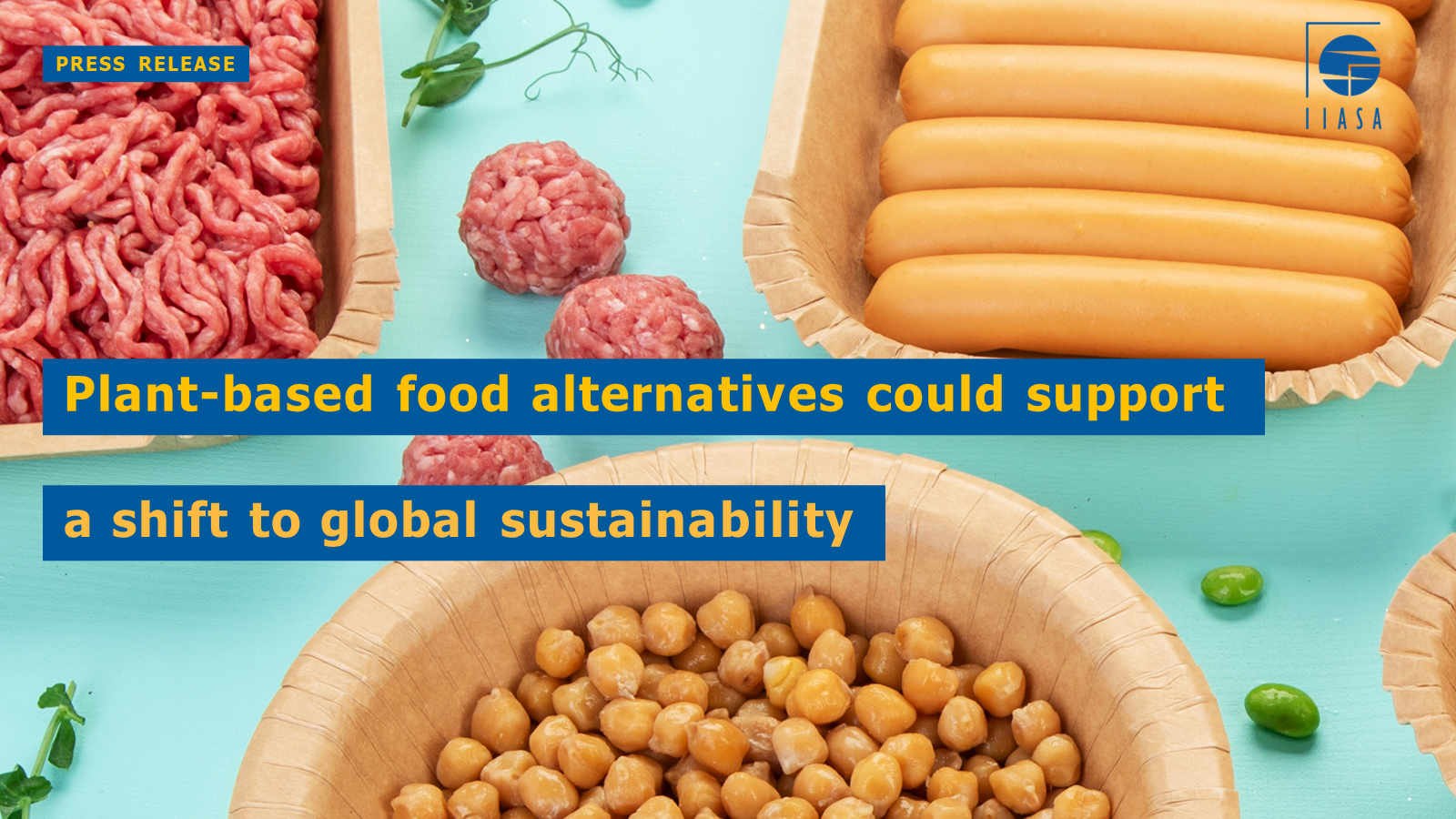 Food on teal background, text reads "News Release, Plant-based food alternatives could support a shift to global sustainability." Logo for the International Institute for Applied Systems Analysis (IIASA) in top right corner.