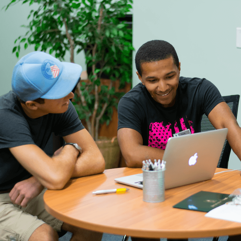 Two students studying together at a table