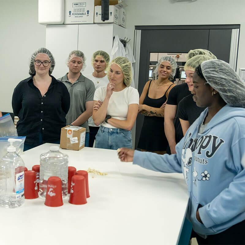 Students learning food production on site