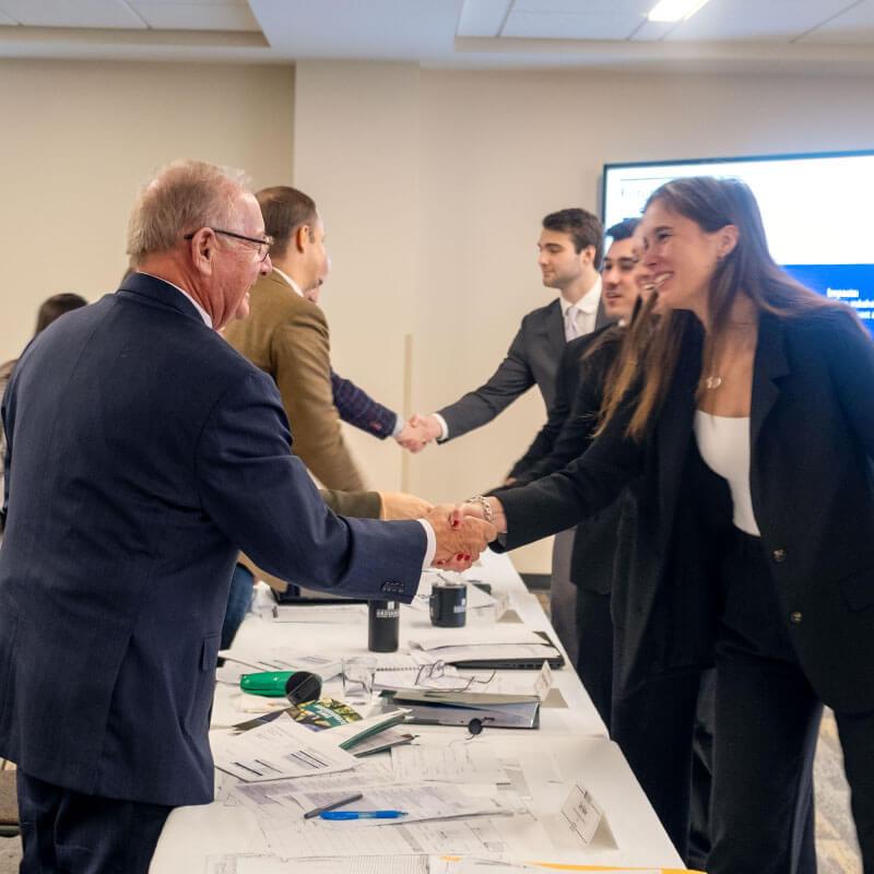 Students Shaking Hands With Judges