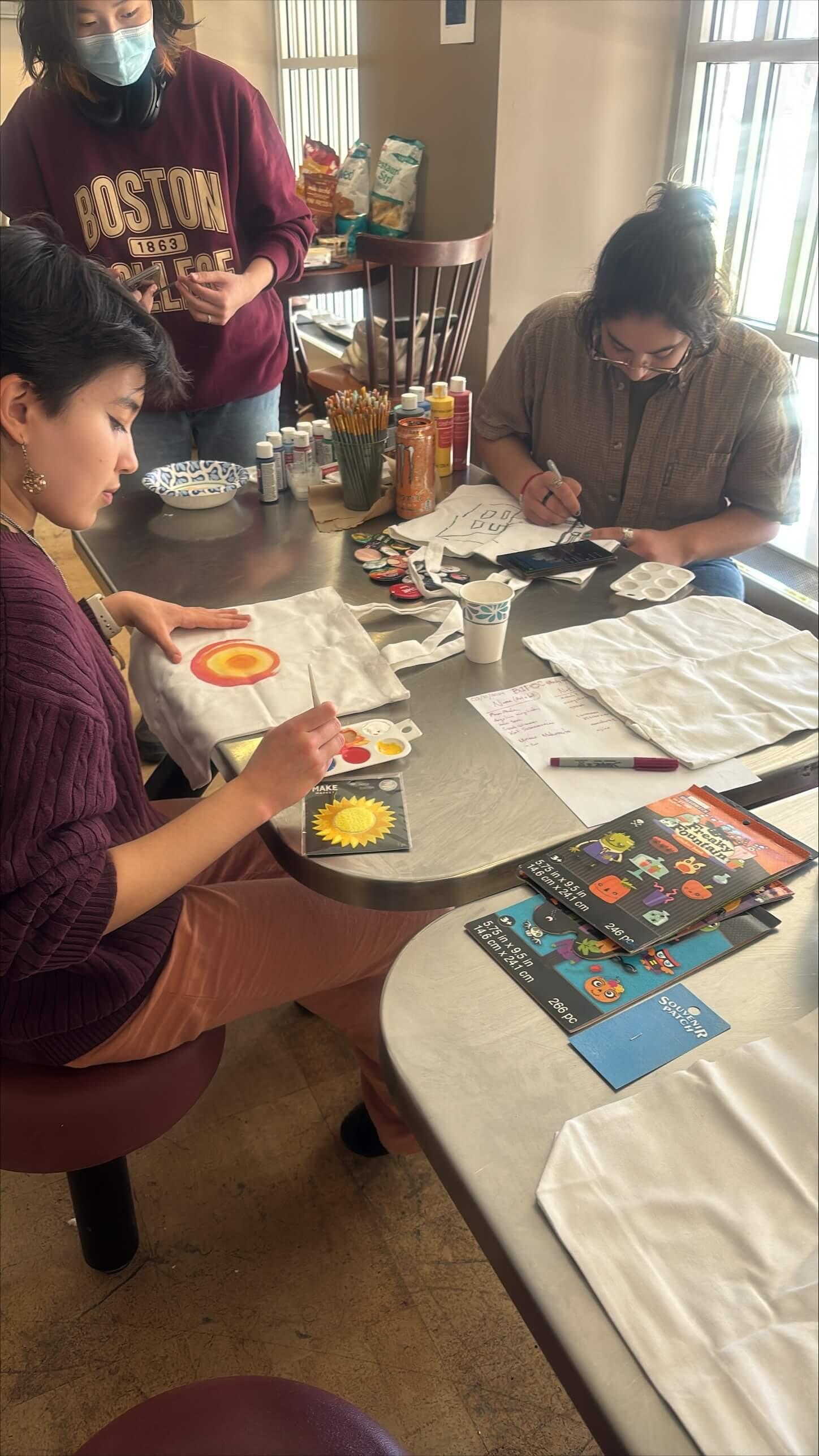 Students painting bags