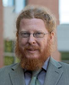 Dr. Travis Reynolds