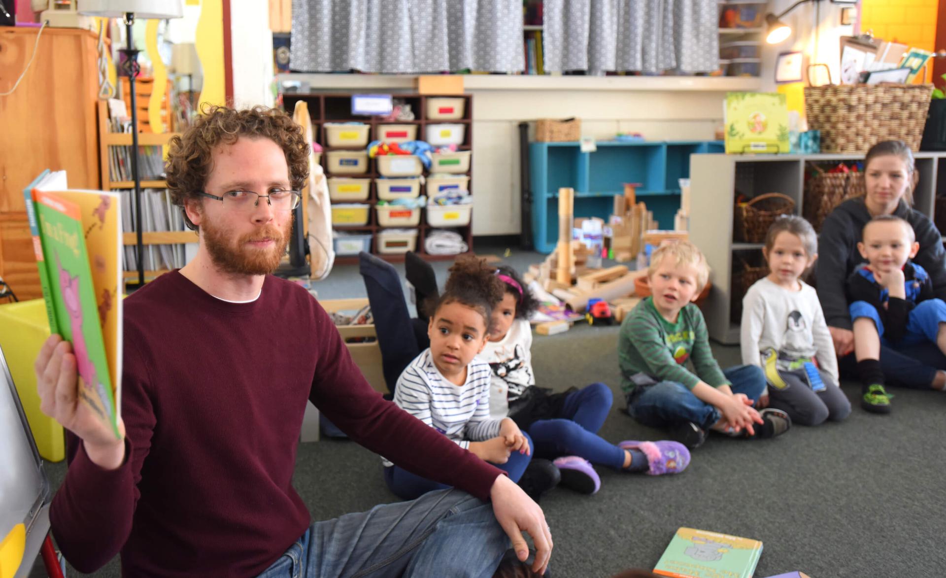 Early childhood special education intern teaching students in a classroom.