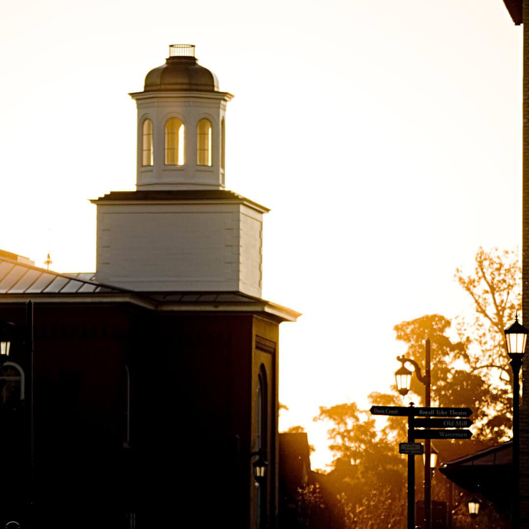 A sunrise behind Pomeroy Hall