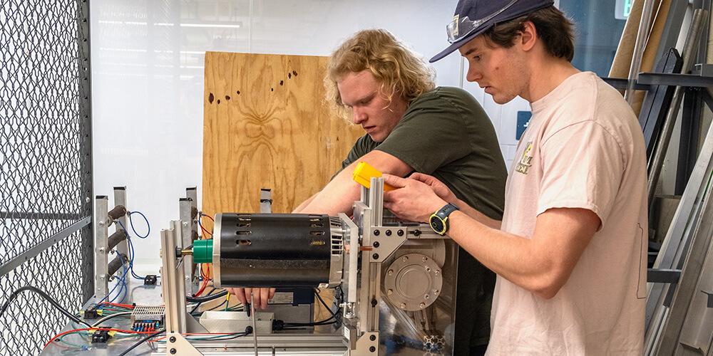 Senior electrical engineering students at work on their capstone project
