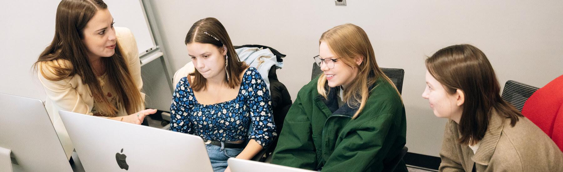 A class working on computers