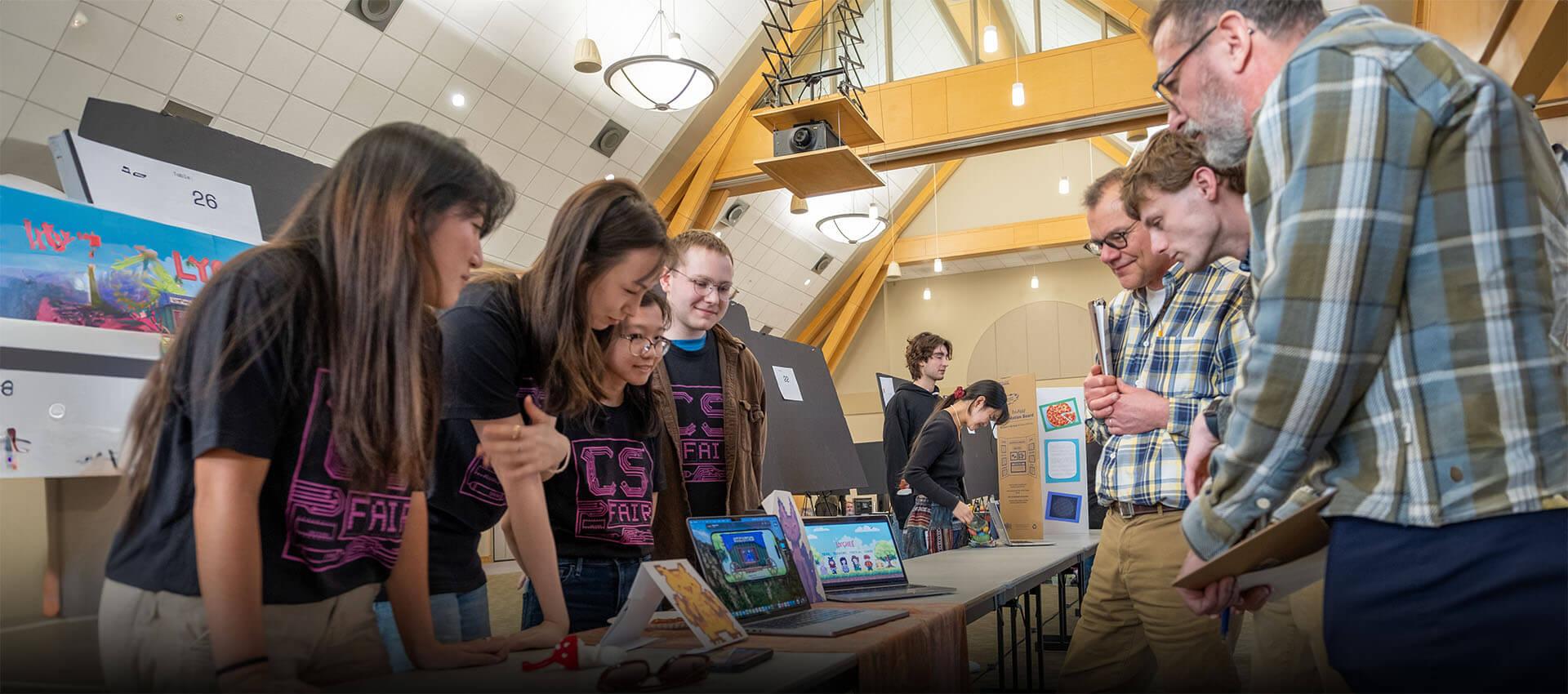 Group of CS students share their app during the Computer Science Fair