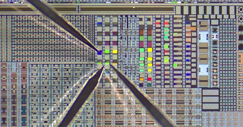 Close up of a semiconductor chip with probes