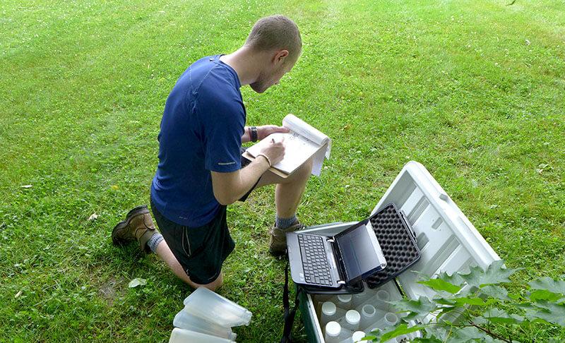 Student conducting environmental field studies