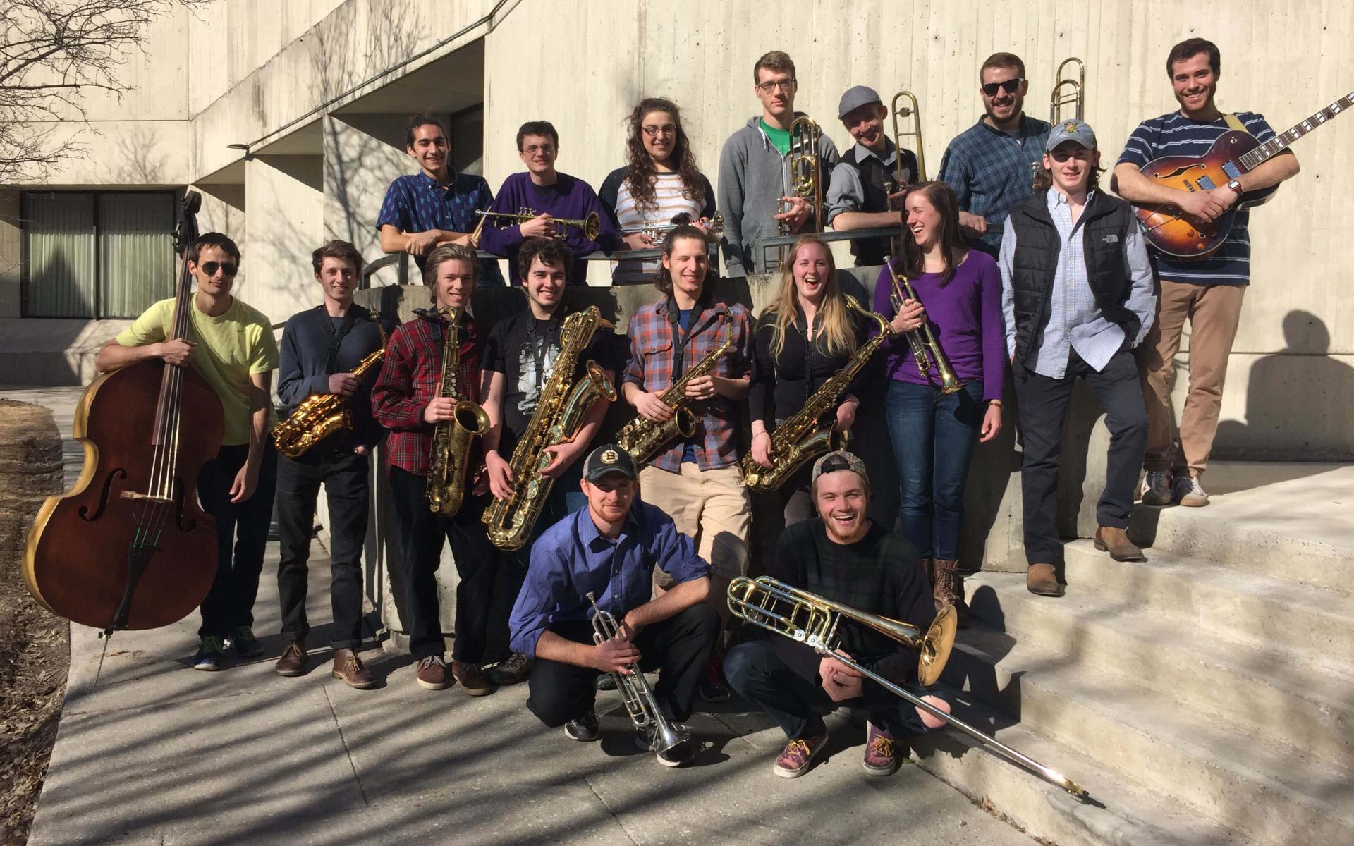 Group of people posing with their instrument