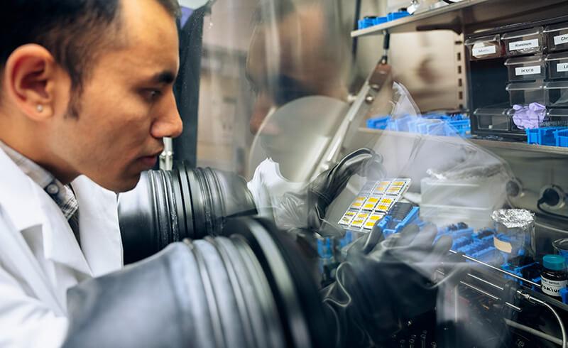 Graduate student working in Physics Lab