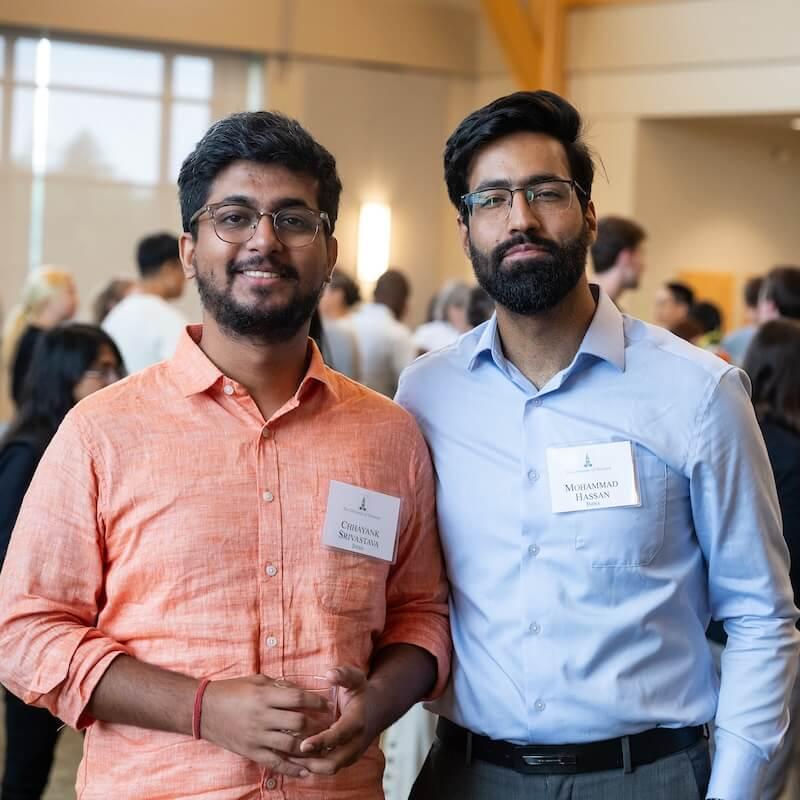 Two smiling students.