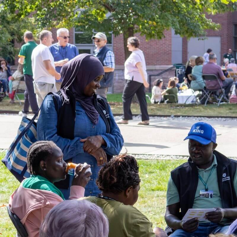 UVM staff members gather across Andrew Harris Commons.