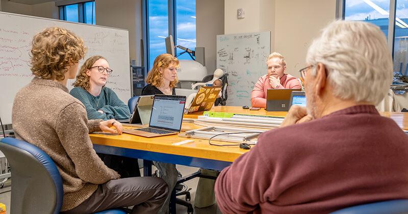 Undergraduate and Graduate student with their mentor in the (Center for Biomedical Innovation)