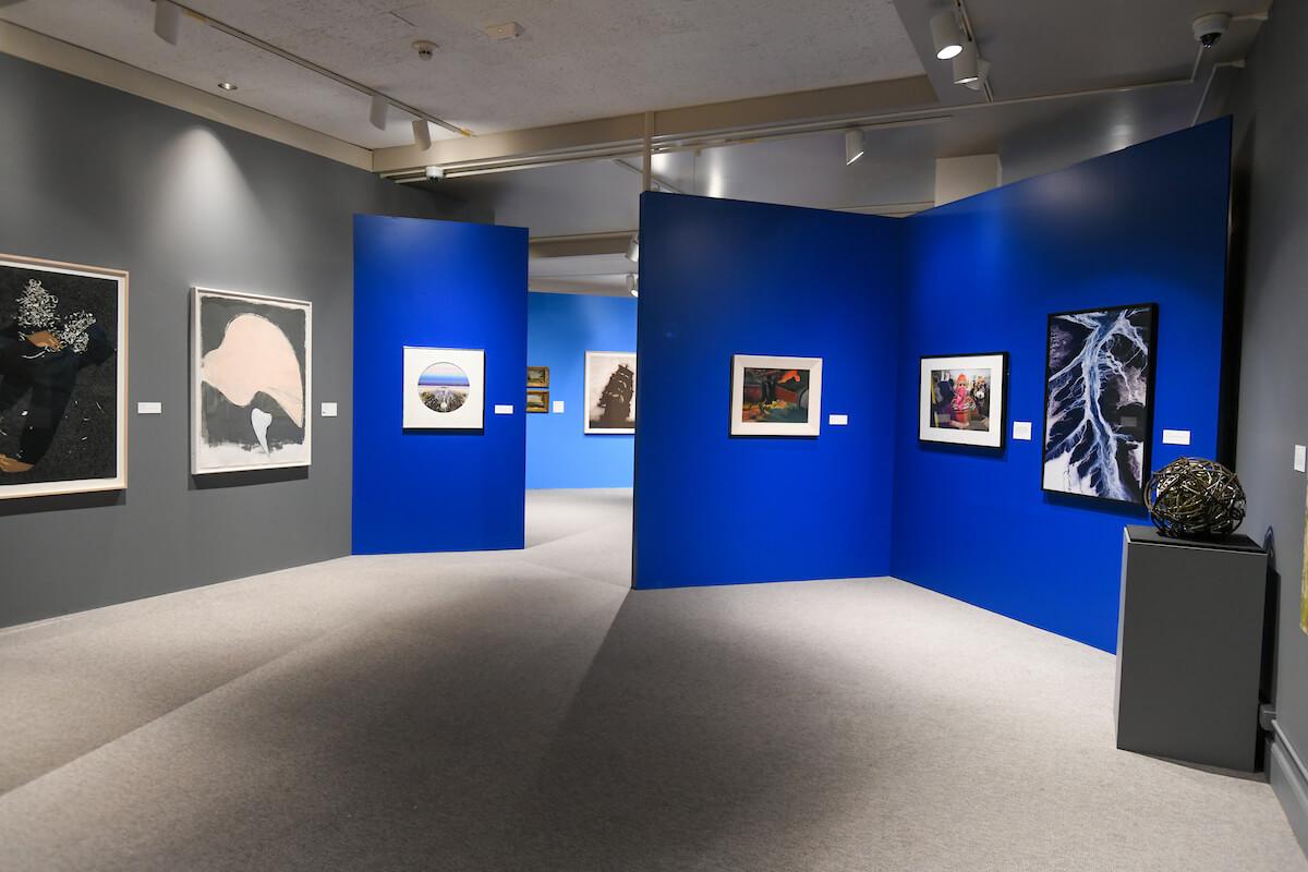 Full of artwork showcases on the wall