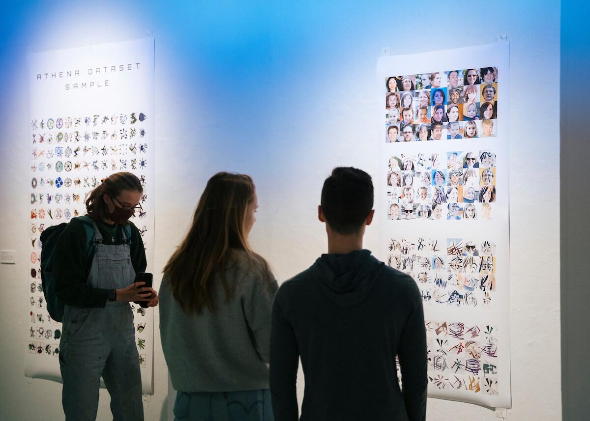 Students looking at art exhibit