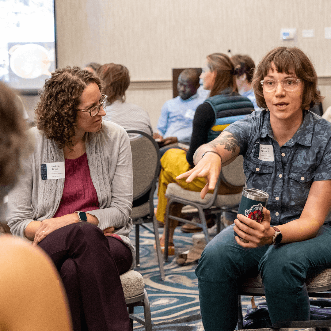 Attendees in conversation